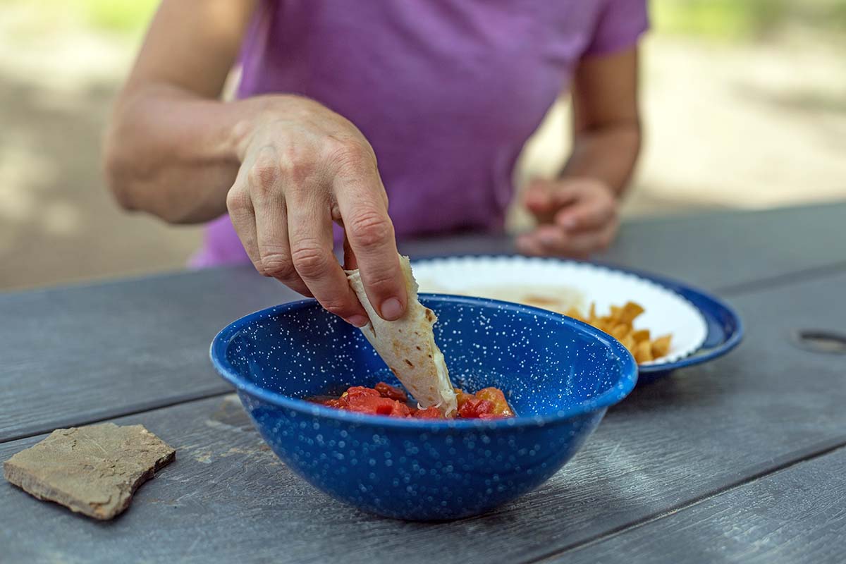 Eating salsa on bikepacking trip