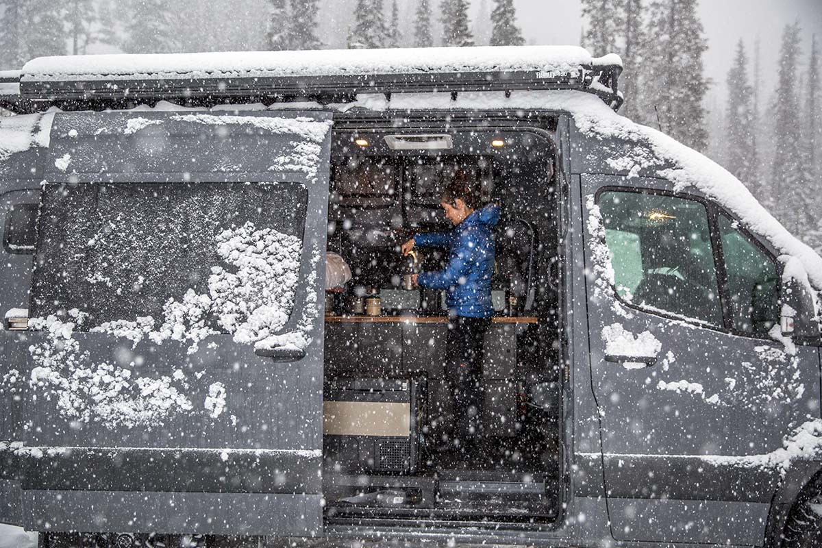 Standing up inside van in snowstorm
