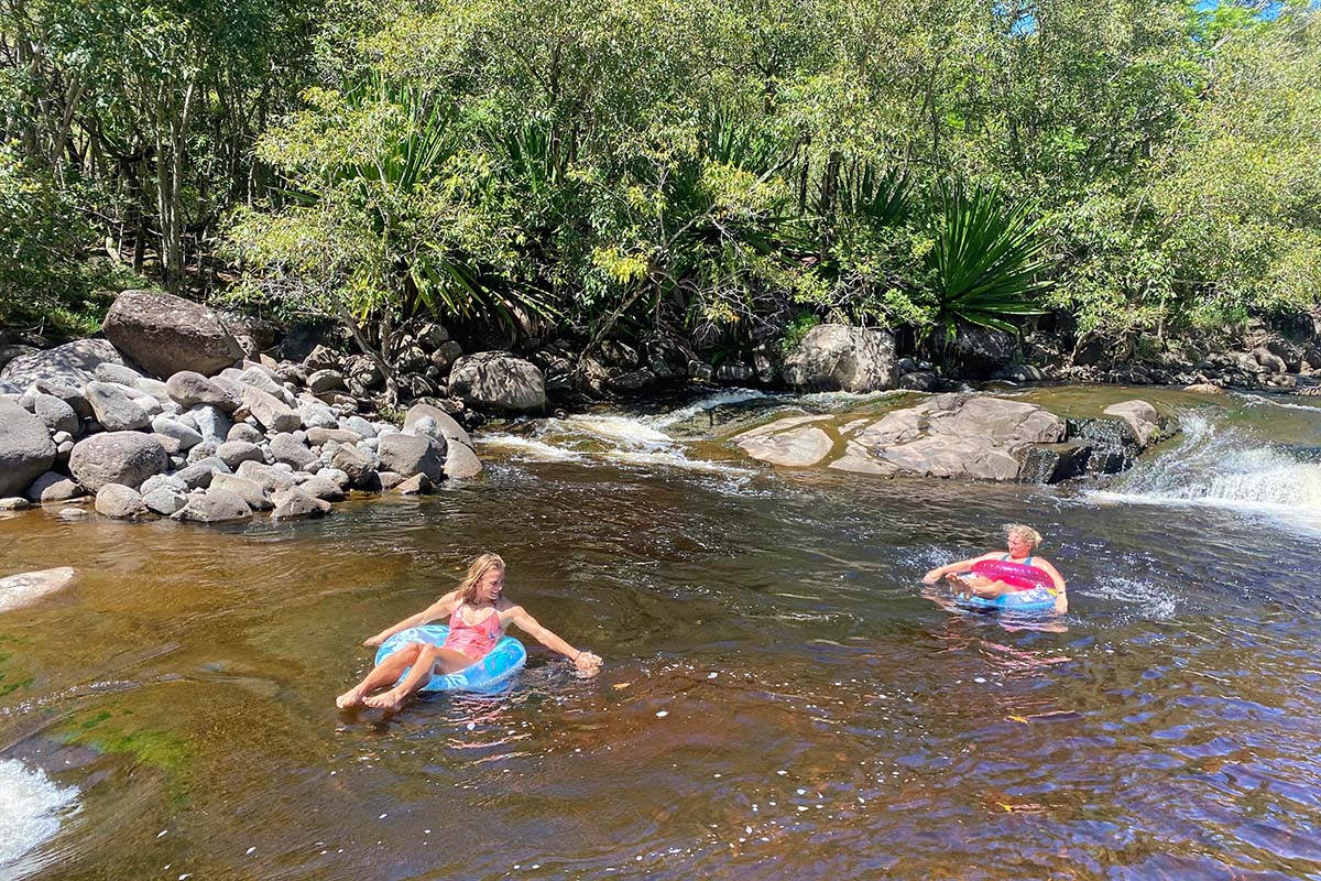 Floating in a river in Waimea Canyon (hiking in Kauai)