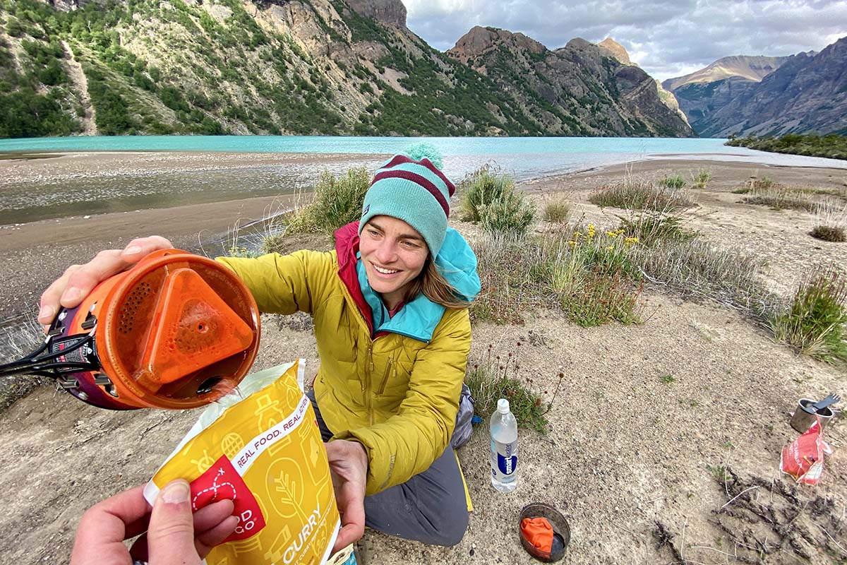 Preparing dehydrated dinner next to Lago Verde