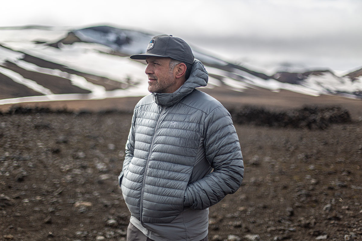 Arc'teryx Cerium Hybrid Hoody (standing in mountains)