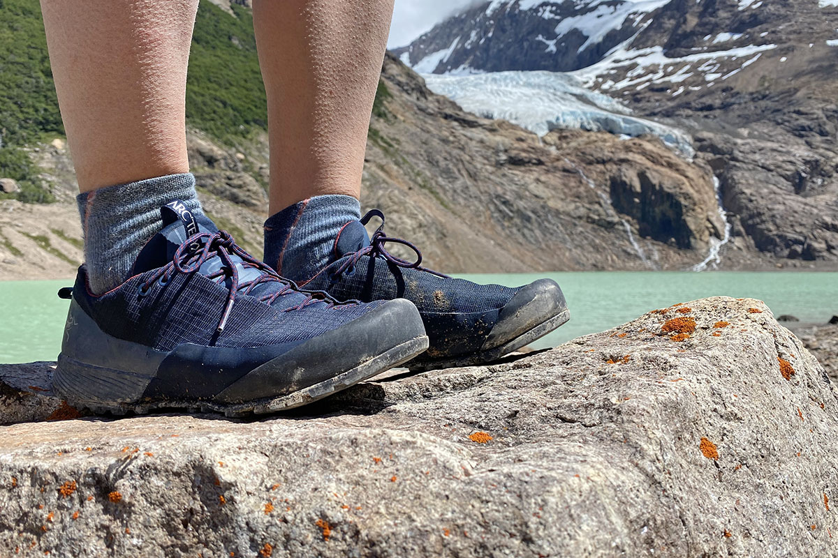 Arc'teryx Konseal FL approach shoe (standing in front of lake)