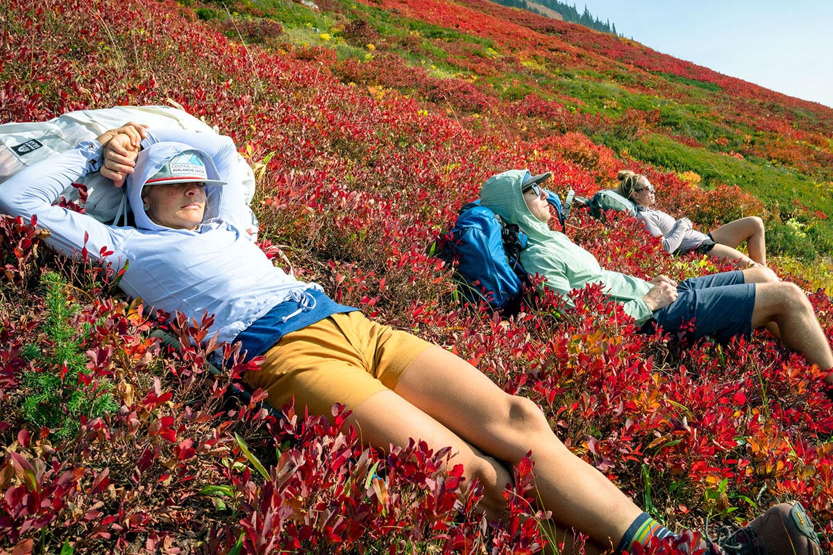 Lying in field of huckleberries (sun shirts)