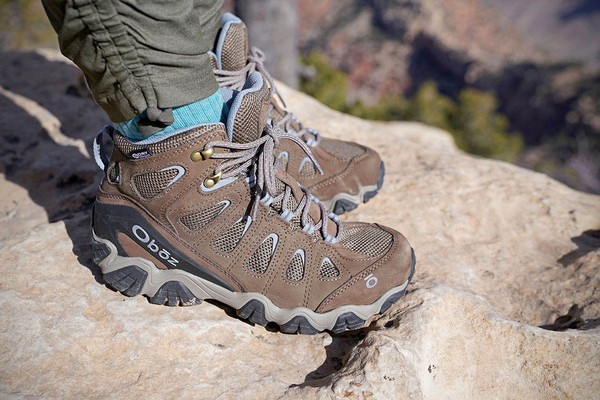 Osprey Sawtooth hiking boot (standing on rock)