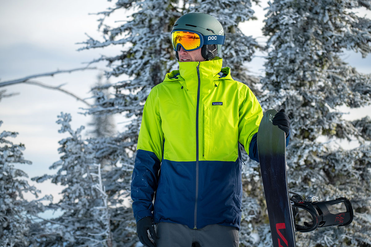 Patagonia 3-in-1 Snowshot ski jacket (standing with snowboard)