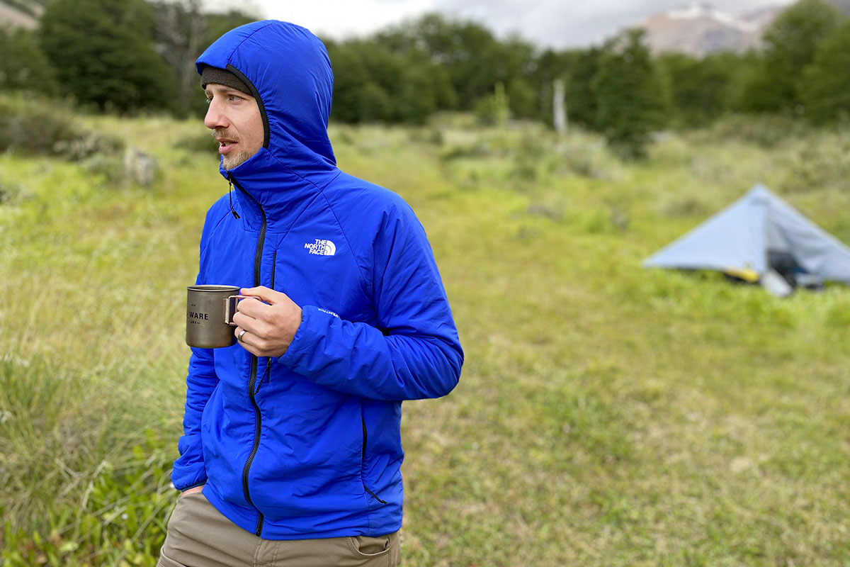 The North Face Ventrix Hoodie synthetic insulated jacket (holding coffee cup in camp)