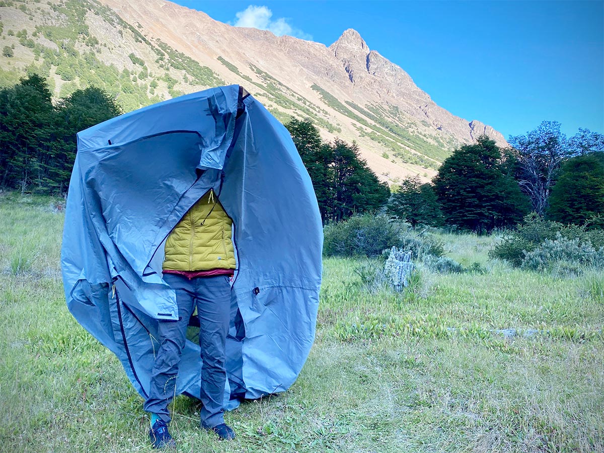 Backpacking tent (collapsed and holding up in front of face)