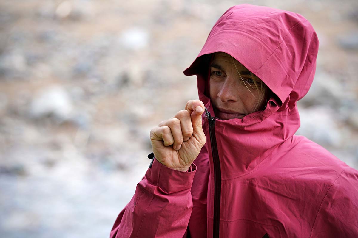 Black Diamond Liquid Point rain jacket (wearing hood and zipping up jacket)