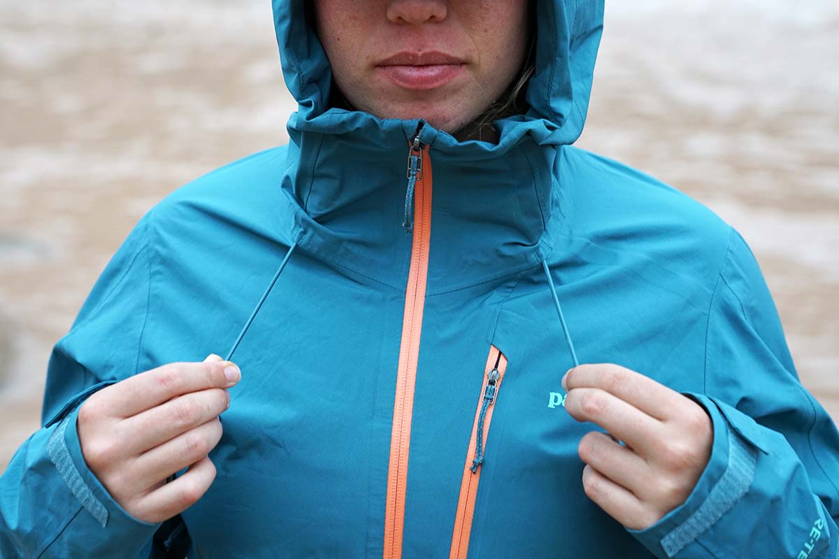 Cinching hood in Patagonia Calcite Rain Jacket