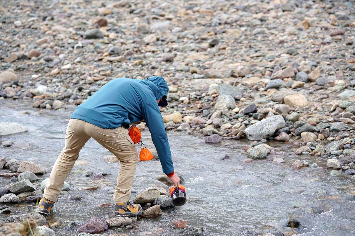 Mountain Hardwear Exposure2 Gore-Tex Paclite Stretch Rain Jacket (collecting water from stream)