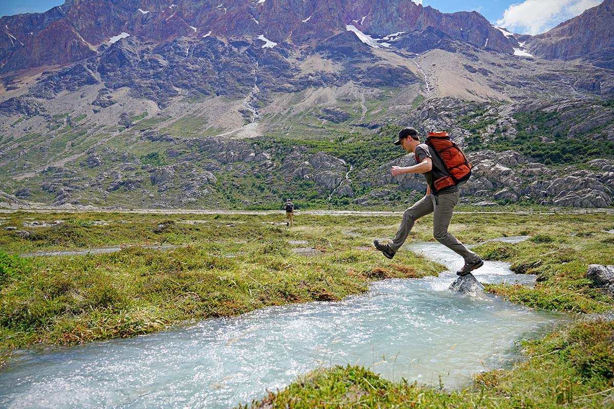 Oboz Bridger Mid Waterproof hiking boots (jumping over stream)