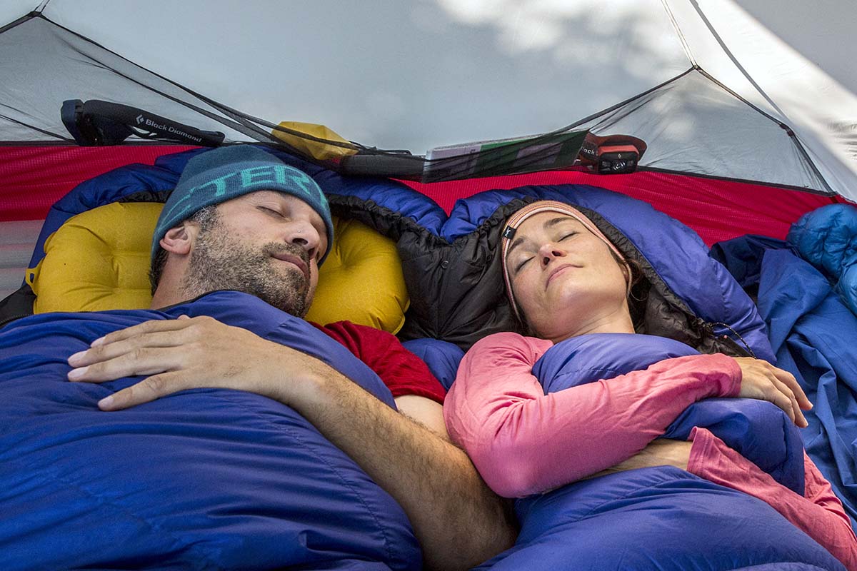 Camping gear (sleeping side by side in tent)