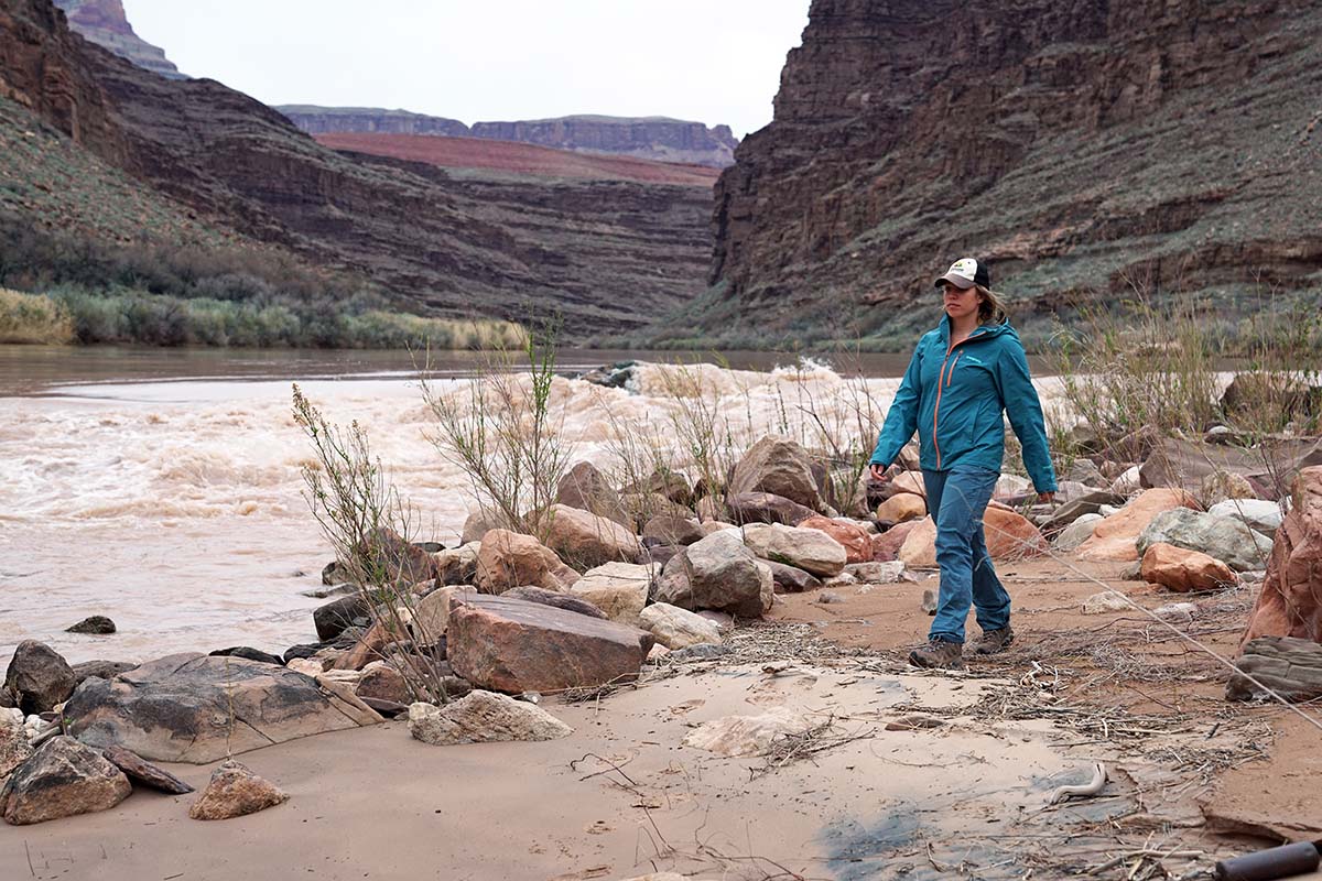 Walking beside Colorado River in Patagonia Calcite rain jacket