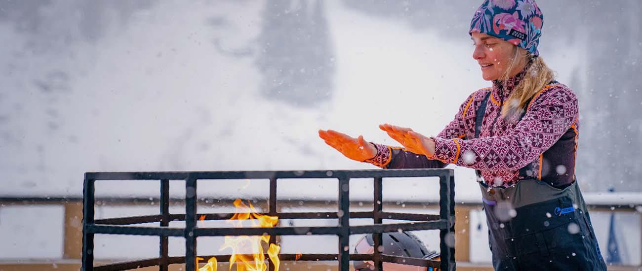 REI Co-op Holiday Warm Up Sale (standing in front of fire at lodge)