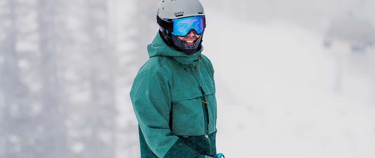 REI First Chair GTX Jacket (standing in snowy forest)