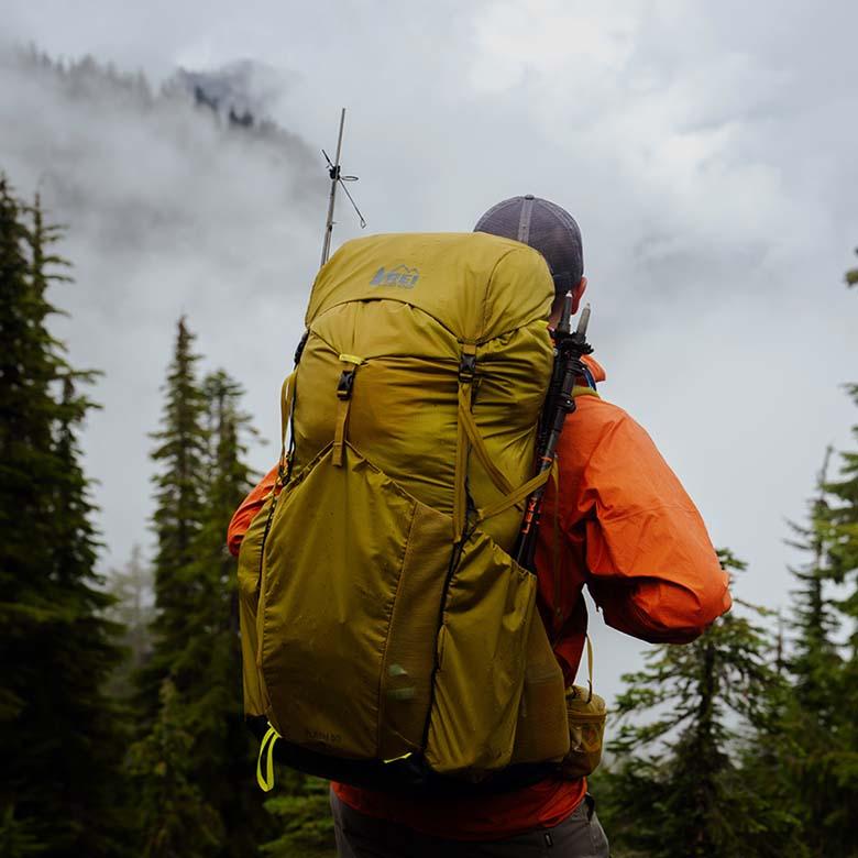 REI Co-op 2024 Anniversary Sale (wearing REI Flash pack in mountains)