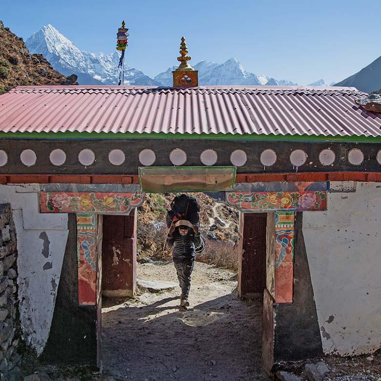 Nepal Trek (porter carrying gear).jpg