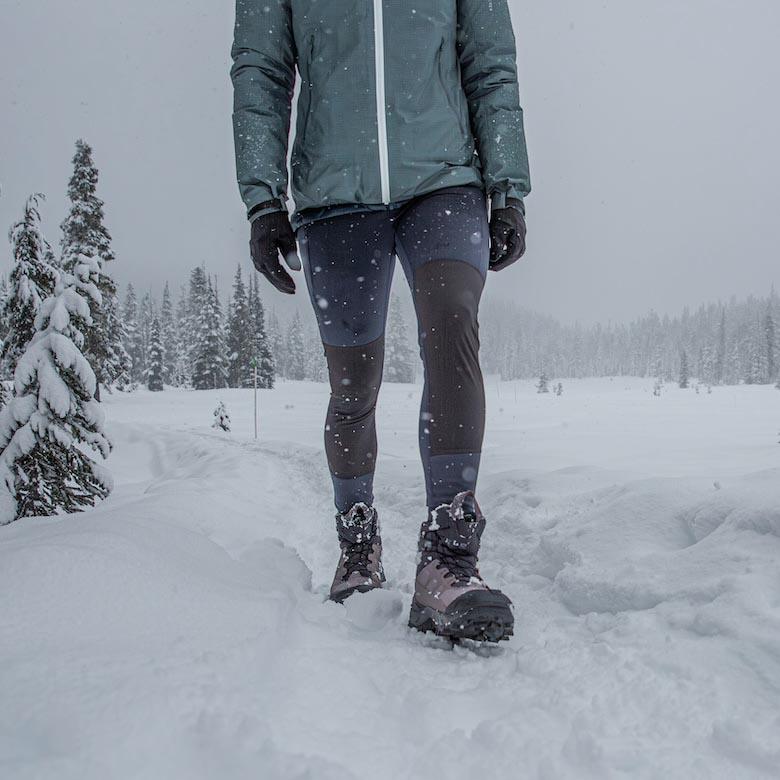 Hiking through a snowstorm with winter hiking boots
