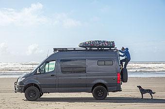 Climbing down Sprinter van rear ladder (on beach)