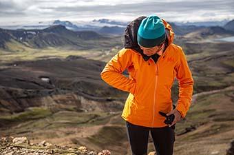 Helly Hansen Vergas Infinity Shell Jacket (standing in mountains)