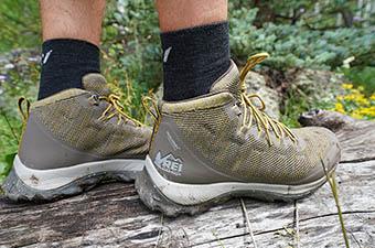 REI Co-op Flash hiking boots (standing on log)