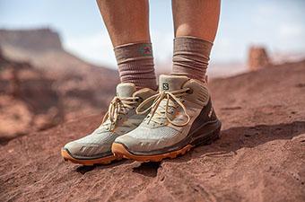 Salomon OUTpulse Mid GTX hiking boot (standing on rock in Utah)