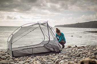 Sea to Summit Alto TR2 backpacking tent (staking out tent on beach)