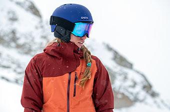 Ski goggles (closeup of goggles and helmet at resort)