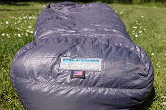 Sleeping bag (Western Mountaineering bag in grass)