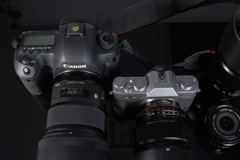 DSLR next to Mirrorless